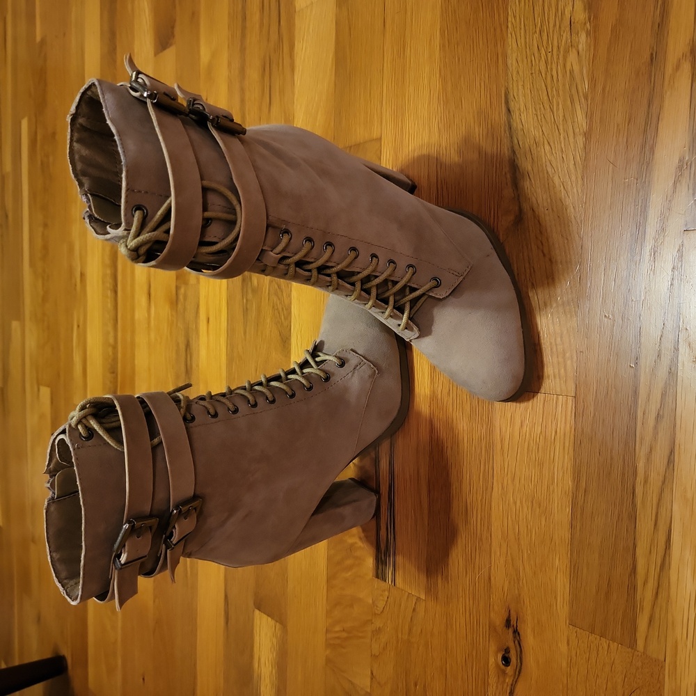 Beige suede boots.